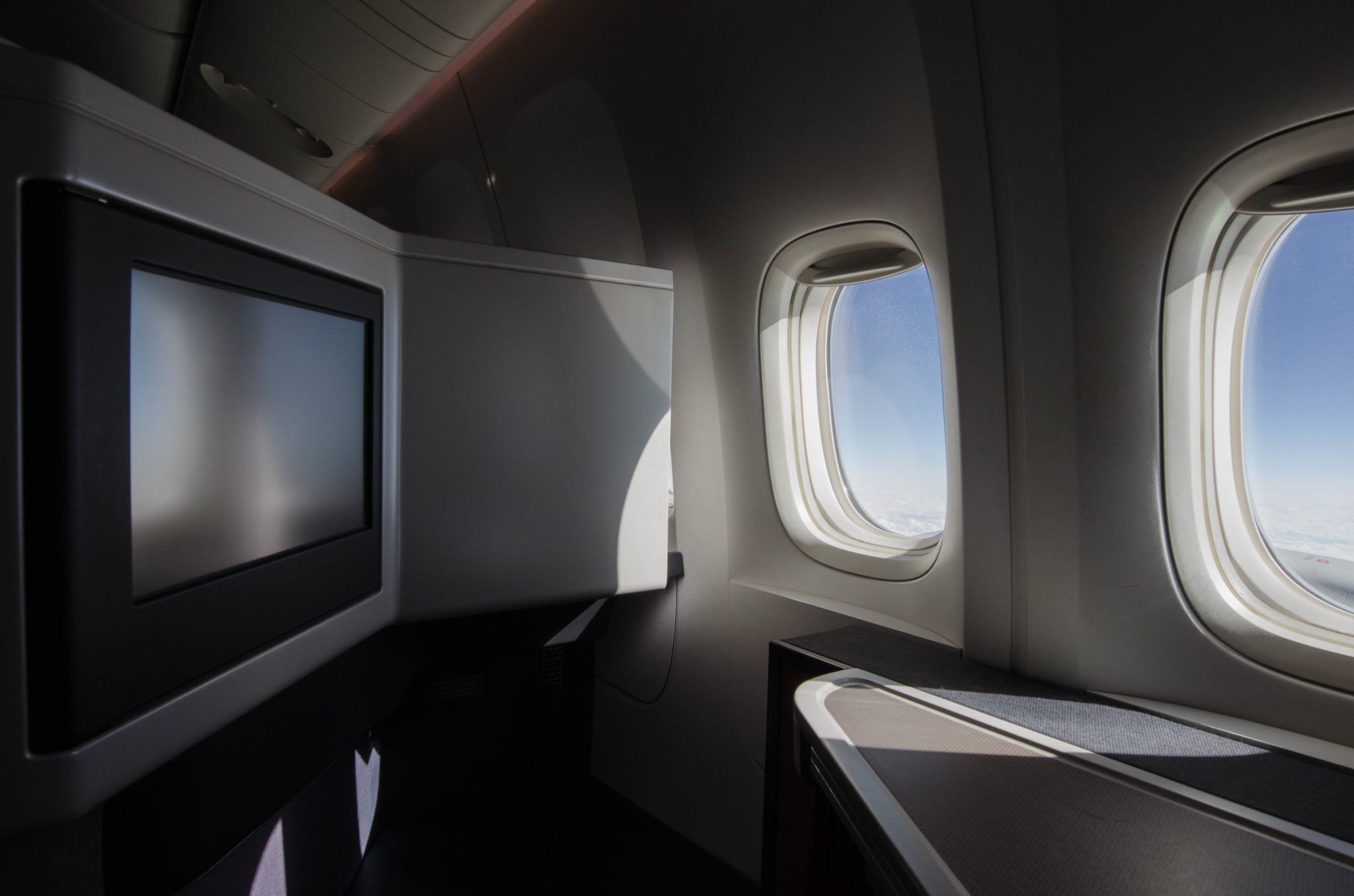 Die Sitze in der Cathay Pacific Business Class sorgen dank der Muschelform für Privatsphäre.