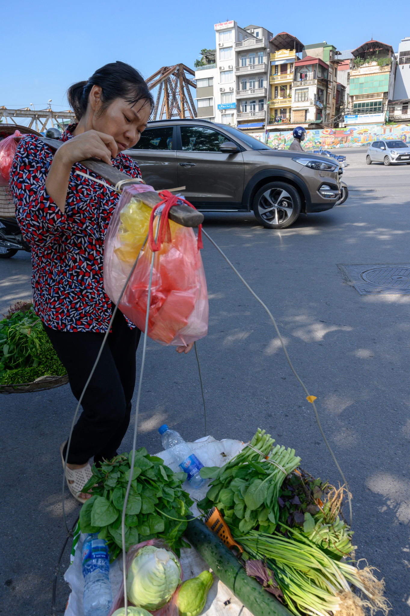 Verkäuferin auf einem Markt in Hanoi
